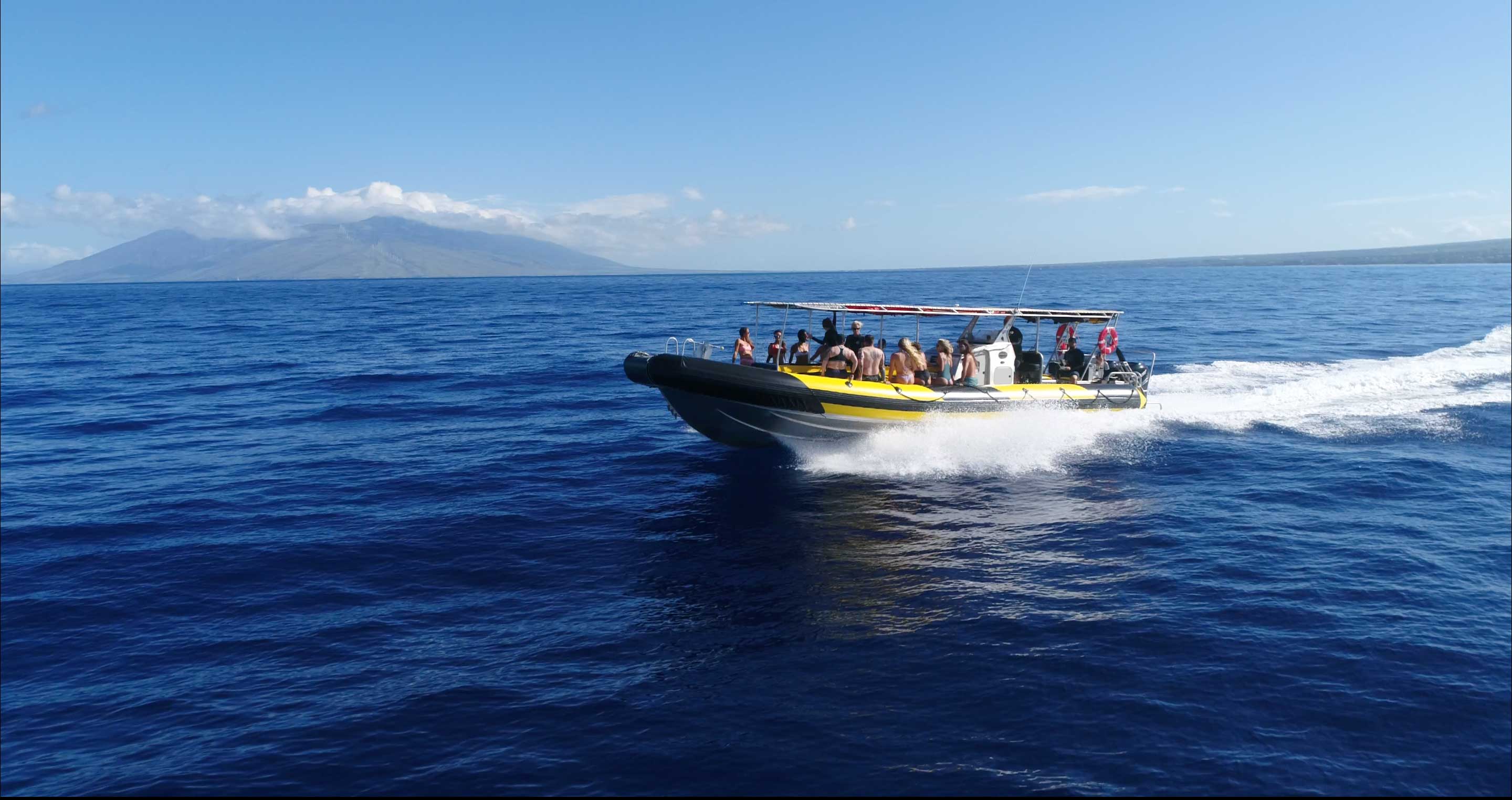No Ka Oi boat moving fast from right to left